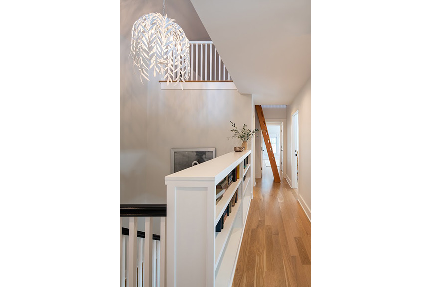 upstairs hall with ladder to attic